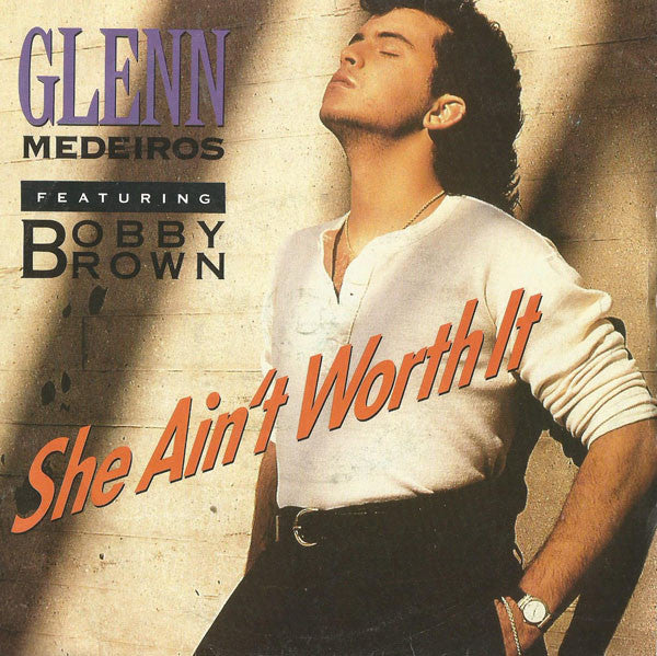 Glenn Medeiros Featuring Bobby Brown : She Ain't Worth It (7", Single, Sil)