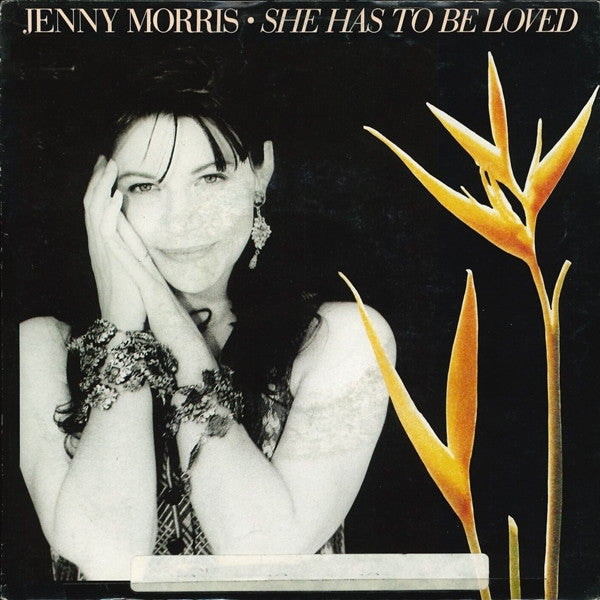 Jenny Morris : She Has To Be Loved (7")